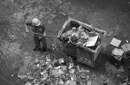 Waterloo waste removal truck collecting trash