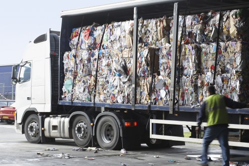Team members managing waste collection for a commercial property