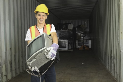 Workers assessing a commercial waste site for hazards